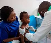 Child receiving medical care at a community health clinic in Kenya